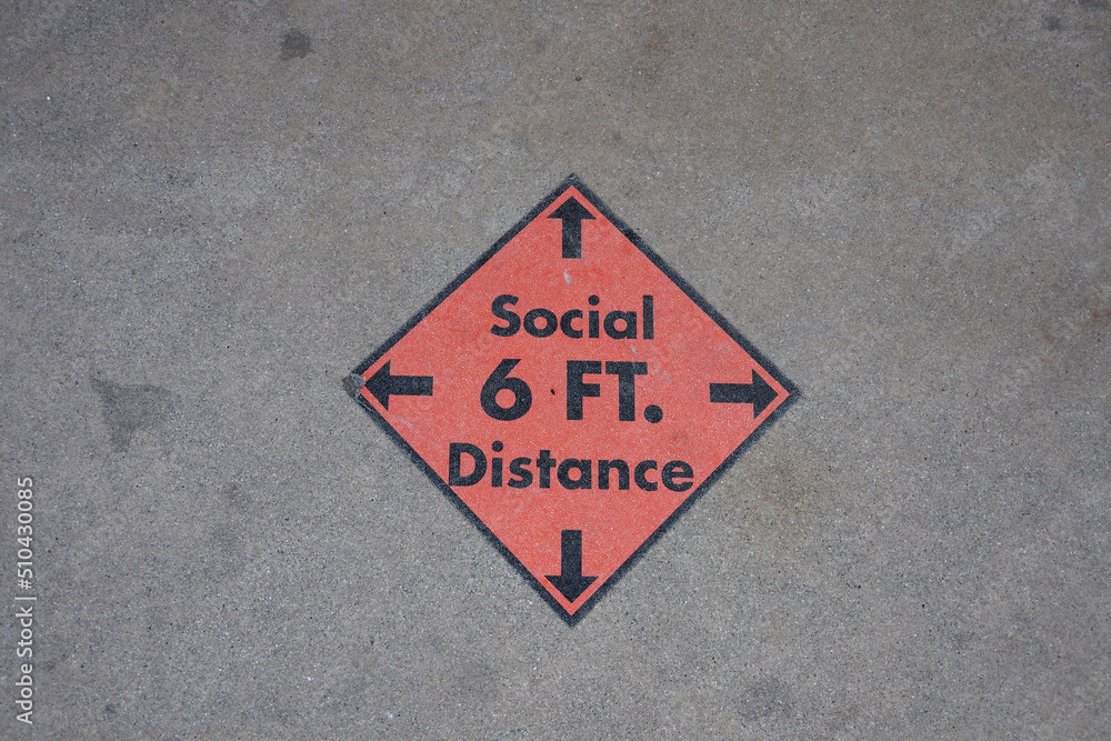 6 FT. SOCIAL DISTANCE marker sign on the ground Stock Photo | Adobe Stock