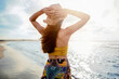© sebra - Young woman at the beach