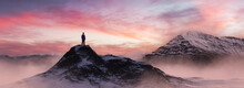 Adventurous Man Hiker Standing On Top Of Icy Peak With Rocky Mountains. Adventure Composite. 3d Rendering Rocks. Aerial Background Image Of Landscape From Canada. Sunset Sky