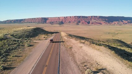 Wall Mural - Road across the canyon mountains, aerial view from drone.