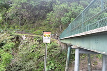Bridge On The Road To Hana Maui Hawaii With Flash Flood Warning Sign