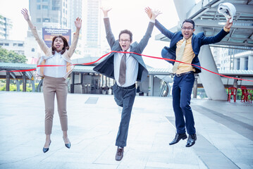 Business competition group of business people in formal suit run to finish line success goal victory strategy. Competitive person race to be first place winner. Multiethnic diversity people contest.