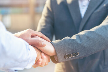 Wall Mural - Trust honesty business customer handshake together promise respect partner. Businessman diversity solidarity team multiethnic Partner hands together teamwork. Multiracial meeting shaking hands concept