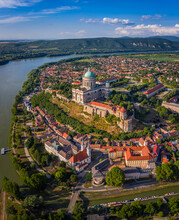 Esztergom, Hungary - Aerial Panoramic View Of Primatial Basilica Of The Blessed Virgin Mary Assumed Into Heaven (Basilica Of Esztergom) On A Summer Day With Blue Clouds And River Danube At Background