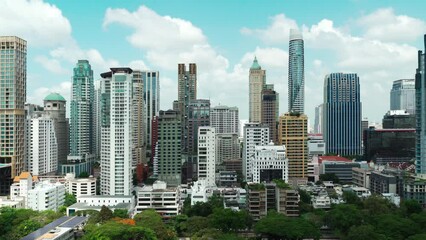 Wall Mural - panning shot of high-rise buildings cityscape near Witthayu road in Bangkok city, Thailand