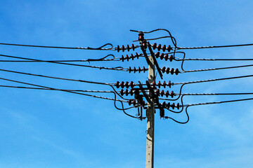 The electrical concrete pole on bule sky