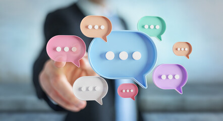 Wall Mural - Man touching with his fingers digital speech bubbles talk icons. Minimal conversation or social media messages floating in front of businessman hand. 3D rendering