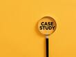 Leinwandbild Motiv Magnifier focuses on the word case study. Education concept.