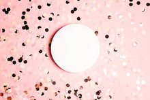 White Round Blank Frame With Confetti Dots On Pink Background. Holiday Greeting Card.