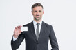 © be free - cheerful businessman in suit hold business card isolated on white background