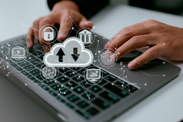 Leinwandbilder - A man works on a laptop that has a diagram of cloud computing on it. Cloud technology is a way to store and access data through a network and the internet.