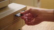 Hand Inserting And Ejecting Floppy Disk Into Vintage Commodore Amiga 2000 PC