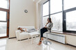© Andrii - A young woman came to an appointment and consultation with a psychotherapist. Counseling and help during depression. Communication with a psychologist and a psychotherapist in the office.