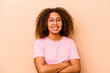 © Asier - Young African American woman isolated on beige background happy, smiling and cheerful.