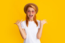 Excited Amazed Woman In Stylish Sunglasses And Straw Hat Isolated On Yellow Studio Background. Female Model With Amazed Expression, Surprised Face.