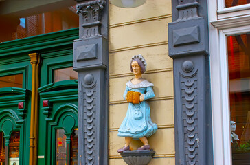 Poster - The wooden sculpture at the tavern entrance, Wernigerode, Germany