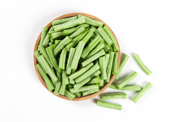 Wall Mural - slice of long bean or cowpea in a plate isolated on white background