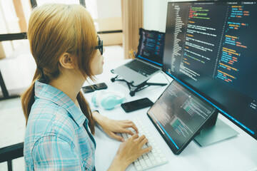 Programmer is coding and programming software.