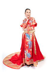 Wall Mural - Portrait of a young asian Chinese female lady model wearing red traditional vintage wedding dress costume smiling and posing with different poses and gestures 