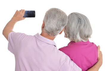 Sticker - Portrait of a happy senior couple taking selfie photo at white background