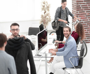 Poster - group of designers and tailors working in the Studio