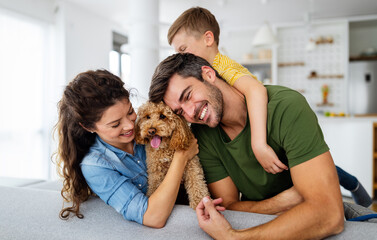 Wall Mural - Happy family spending time together, having fun at home