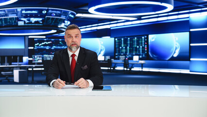 TV Live News Program: Charismatic White Male Presenter Reporting. Television Cable Channel Anchorman or Host Talking about Important Events. Network Broadcast Mock-up. Modern Newsroom Studio