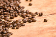 close-up of coffee beans on a wooden table