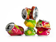 Crumpled bright aluminum soda cans on white, studio shot. Ecology, the concept of recycling and environmental protection.