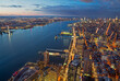 Aerial view of New York city and New Jersey illuminated at dusk with Hudson River