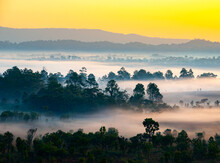 Layer Of Natural.Aerial View Sunrise Over Mountain With Fog Over The Ground In Foreground Savannah Meadow , Petchaboon Province, Thailand,asia.