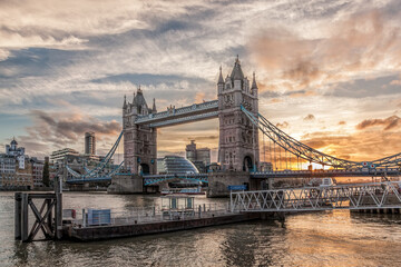 Fototapete - Tower Bridge against colorful sunset with pier in London, England, UK