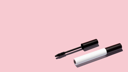 Poster - Creative layout of mascara on pink background. Make up products. Copy space.