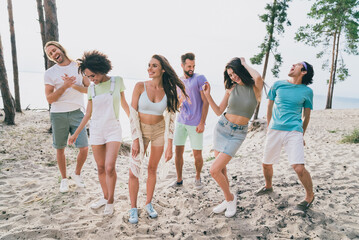 Sticker - Photo of charming pretty young people wear casual clothes dancing beach festive outside countryside