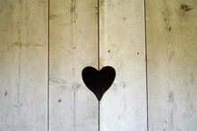 Old Awesome Wooden Toilet Door With A Heart