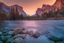Merced River Flows Through Yosemite Valley In Yosemite National Park, During Golden Hour , CA, USA