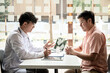 © Freedomz - Male doctor writing prescription and explaining the results of the examination to the patient after diagnosis