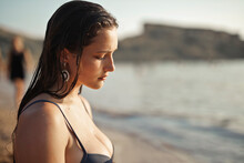 Portrait Profile Of A Young Woman At The Sea