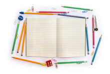 Back To School. School Supplies ( Copybook, Pencils, Sharpener, Clips, Compass ) On A White Background With Space For Text. Top View, Flat Lay
