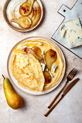 French Crepe with blue cheese and caramelized pears. Sweet and savoury homemade crepes pancakes recipe