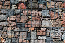 Retaining Wall Gabion Baskets, Gabion Wall Caged Stones Textured Background. Gabion Wall Caged Stones.