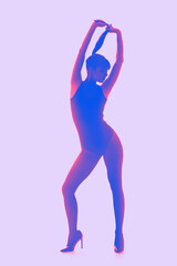 Wall Mural - Silhouette of beautiful young woman on lilac background