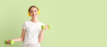 Sporty Young Woman With Dumbbells Listening To Music On Green Background With Space For Text