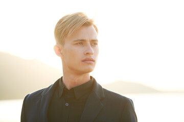 Poster - blond man on the seashore