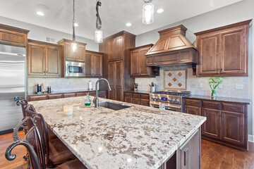 Wall Mural - larger kitchen with granite countertops, floor to ceiling cabinets and hardwood floors