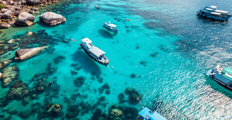 Canvas Print - Boats and crystal clear waters at the bay dive site in Koh Tao,diving tour boat