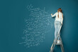 © millaf - Small child math student writing science formulas on blue background