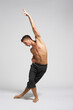 © Alexander Y - modern ballet male dancer posing over white studio background