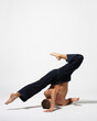 © Alexander Y - modern ballet male dancer posing over white studio background