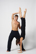 © Alexander Y - young couple of modern ballet dancers posing on clear studio background